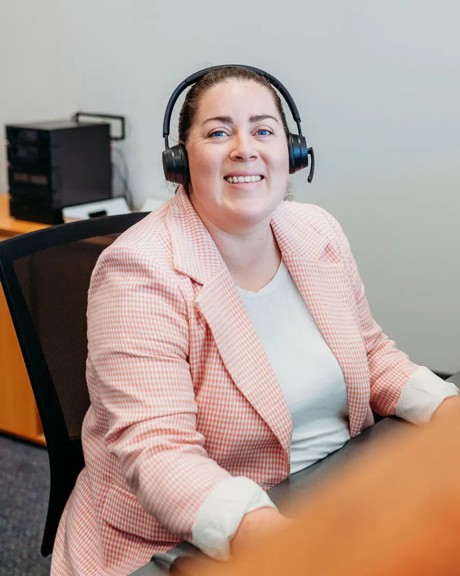ITstuffed team member Laura assisting clients from the service desk